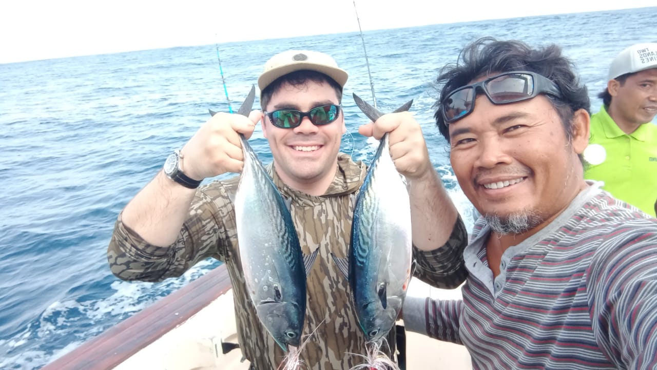 Traditional fishing boat on calm Bali coastal waters