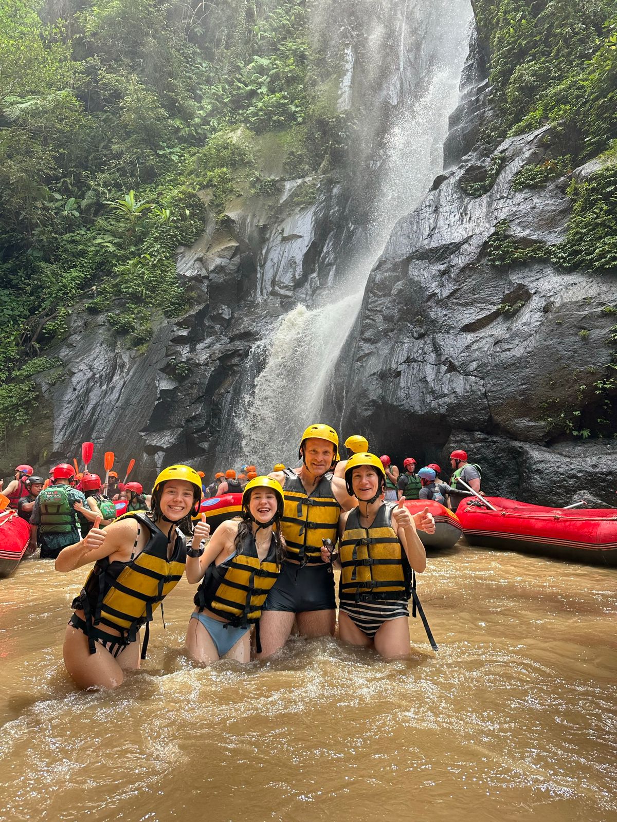 Rafting guide steering the raft through rocks